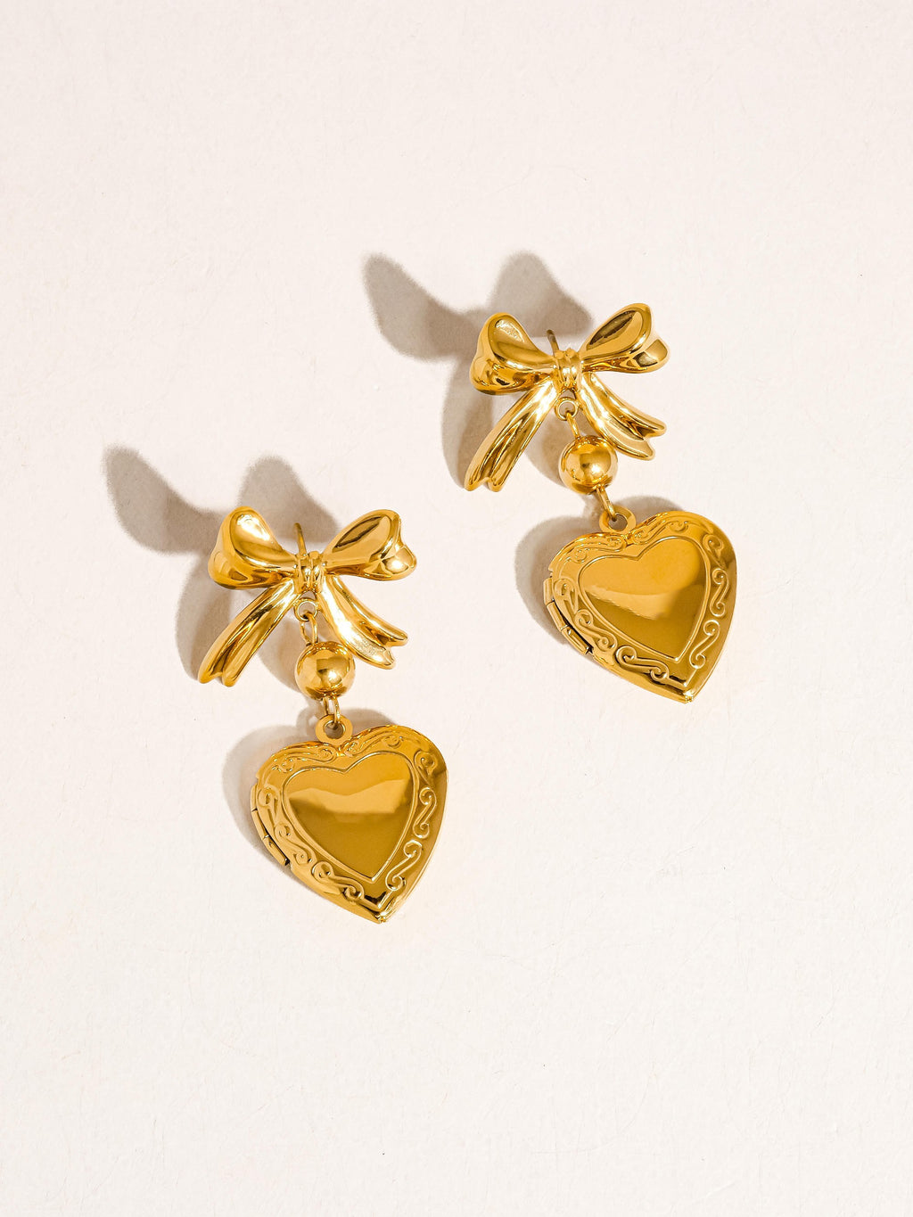 18k Heart And Bow Locket Earring