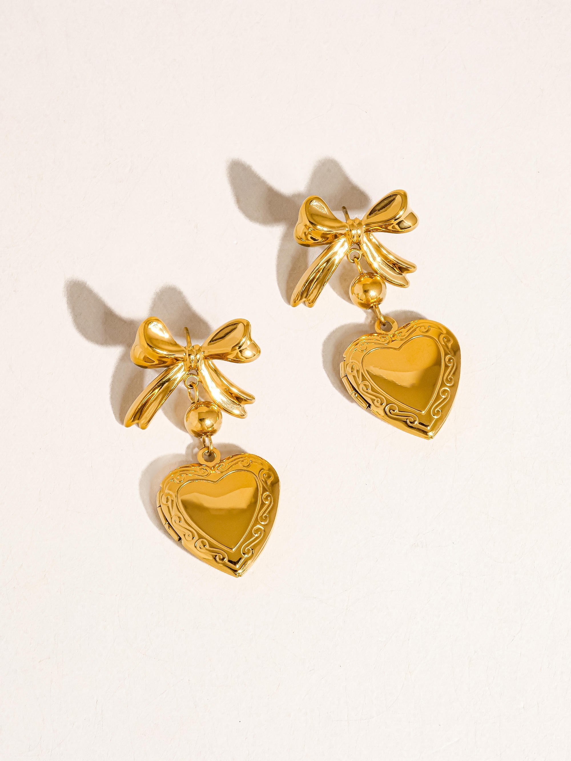 18k Heart And Bow Locket Earring