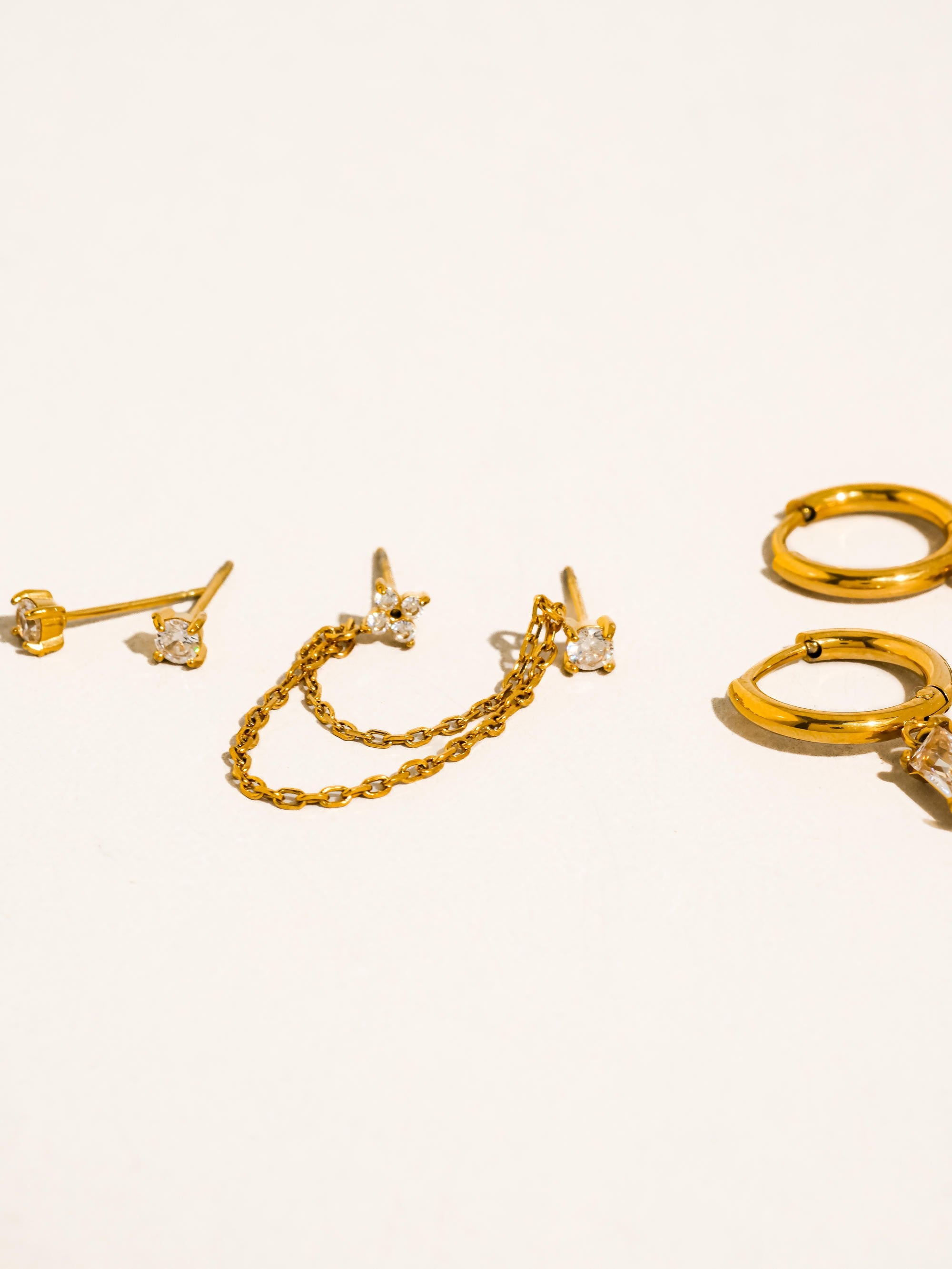 Roussa 18k Gold Cz Chain Earring Set Of Three